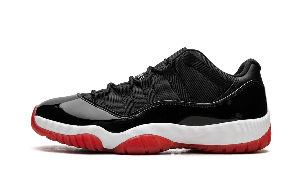 Air Jordan 11 Low Sneakers – Black, Red & White