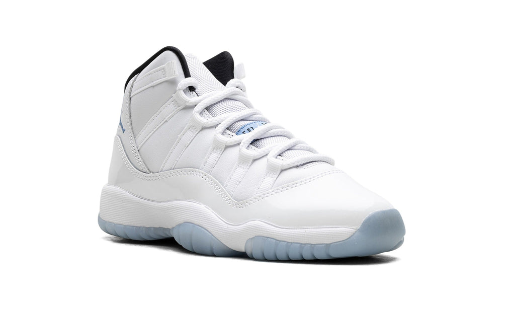 Air Jordan 11 Sneakers in White & Cream