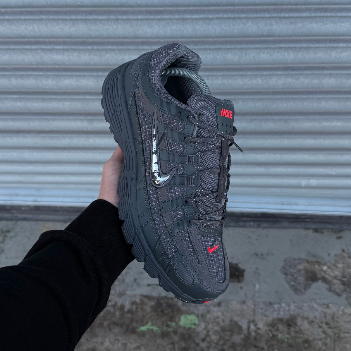 Nike P-6000 Sneakers – Dark Grey with Silver & Red Accents