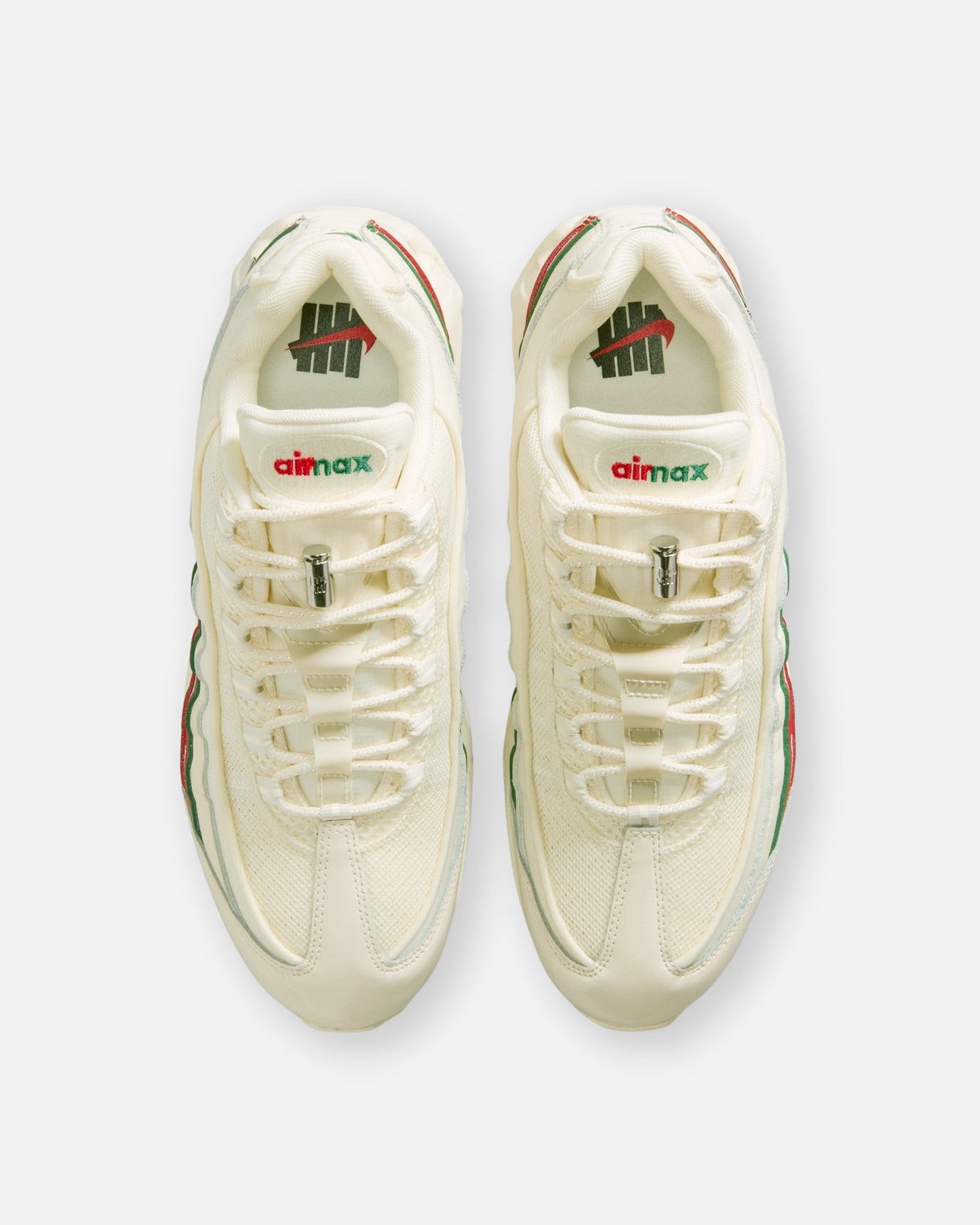 UNDEFEATED x Nike Air Max 95 Sneakers – Cream with Red & Green Accents
