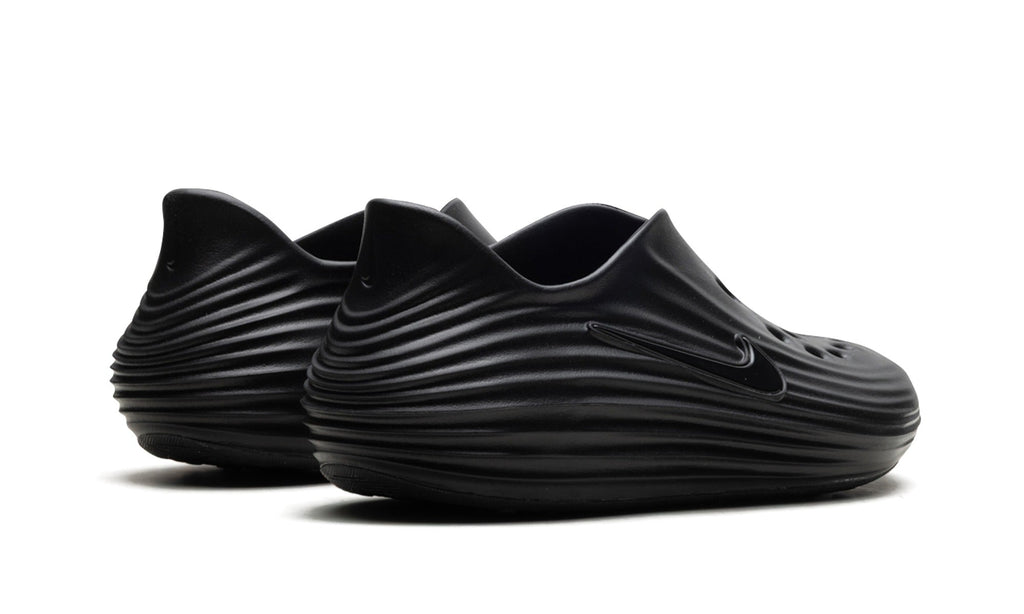 Nike ReactX Rejuven8 Slip-Ons in Black
